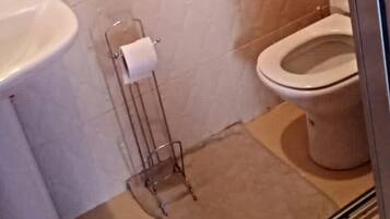 Shower, bathrobes, towels