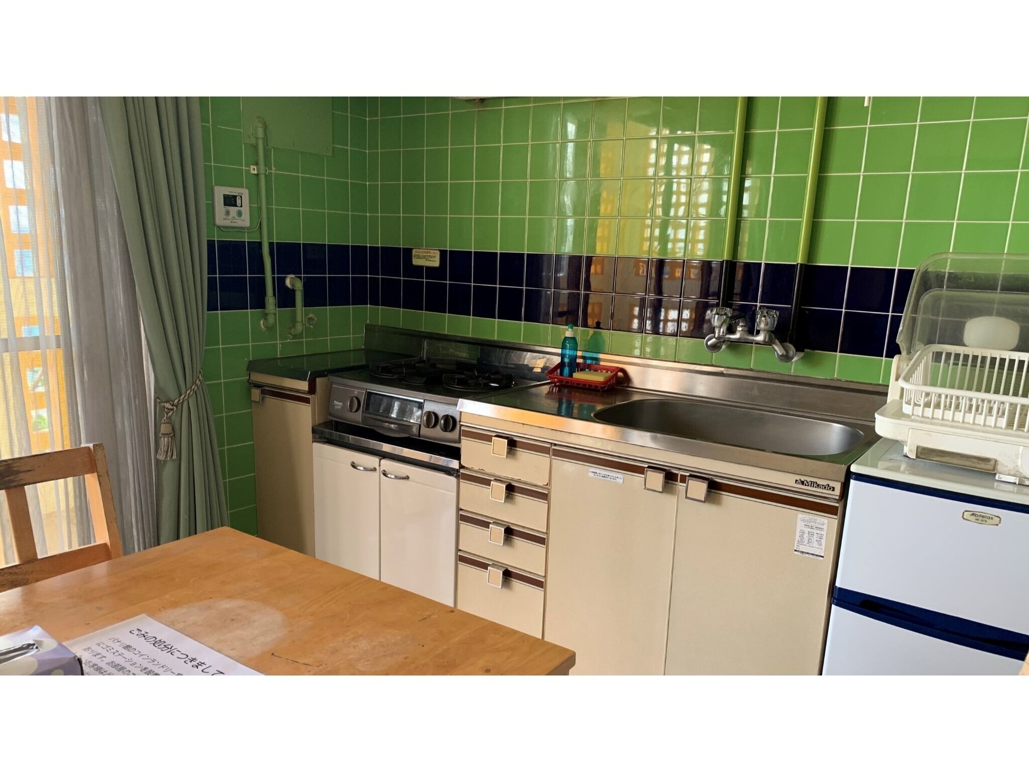Fridge, microwave, stovetop, cookware/dishes/utensils