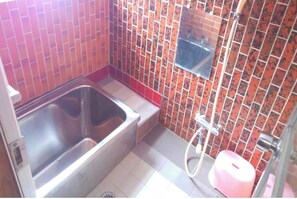 A bathroom with a bathtub, a toilet, and a shower area. - One building charter plan Experience the country / Echizen Fukui (Echizen)