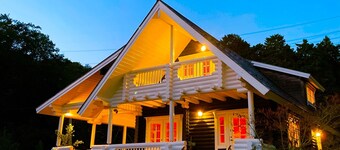 A fullfledged resort log house facing a mountain  / Takashima Shiga