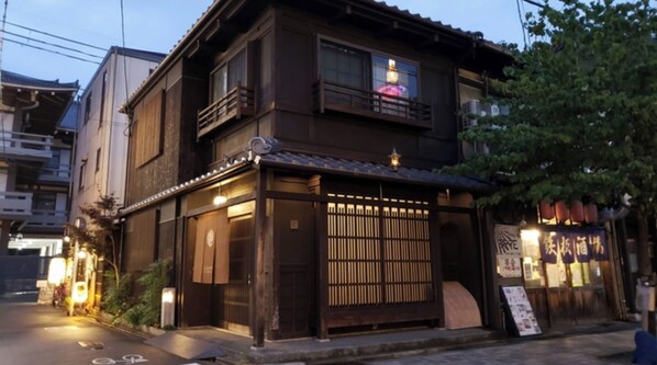 Traditional Japanese building with a bike-friendly entrance.