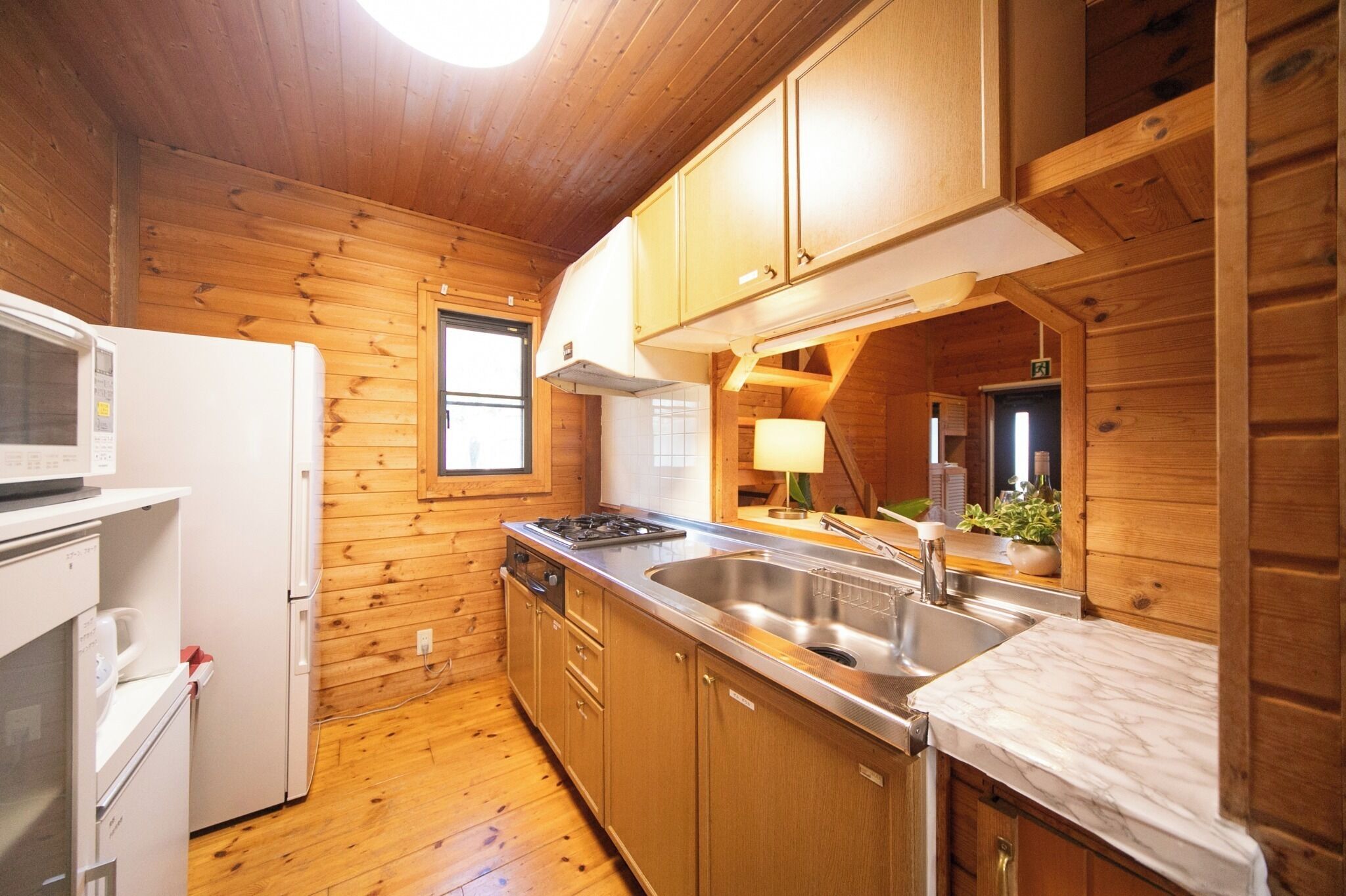 Fridge, microwave, stovetop, cookware/dishes/utensils