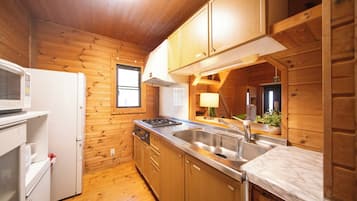 Fridge, microwave, stovetop, cookware/dishes/utensils