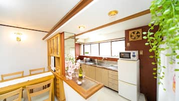 Fridge, microwave, cookware/dishes/utensils
