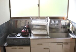 Fridge, microwave, stovetop, cookware/dishes/utensils