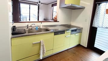 Fridge, microwave, stovetop, cookware/dishes/utensils