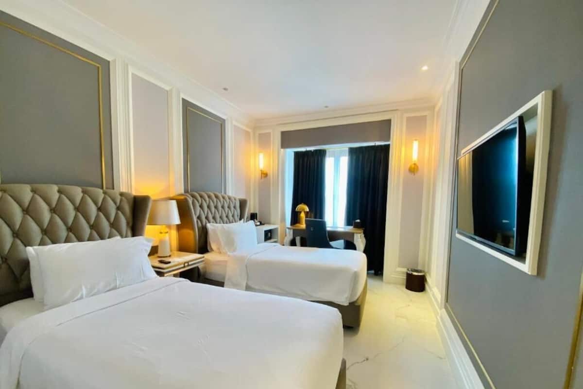 Premium bedding, in-room safe, desk, soundproofing
