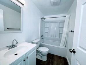Hair dryer, towels, soap, shampoo