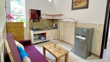 Standard Apartment, 2 Bedrooms | Living area | TV