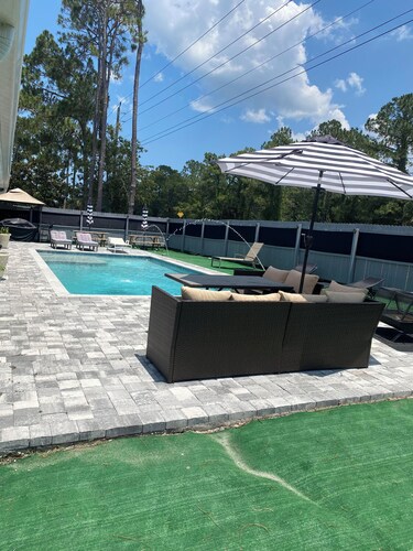 Stunning Modern beautiful house in Palm Coast, FL. W/ Heated Salt Water Pool.


