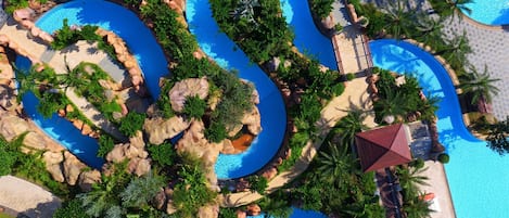 Indoor pool, 6 outdoor pools, open 7:30 AM to 10:00 PM, pool umbrellas