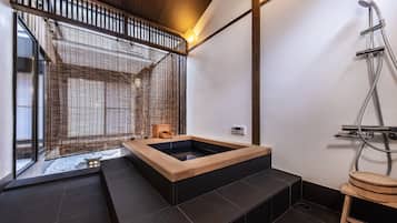 Traditional Townhome | Bathroom | Separate tub and shower, deep soaking tub, hair dryer, slippers