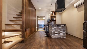 Traditional Townhome | Living area | Flat-screen TV