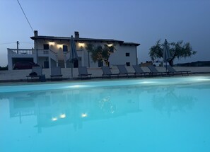 Outdoor pool, pool umbrellas, pool loungers