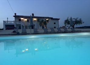 Outdoor pool, pool umbrellas, pool loungers