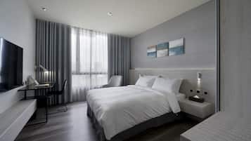 Down comforters, free minibar, in-room safe, desk