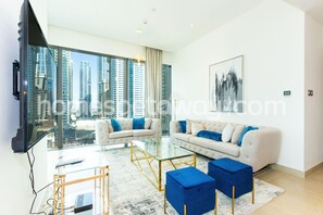 Apartamento superluxo | Área de estar | Smart TV 55 polegadas com canais a cabo
