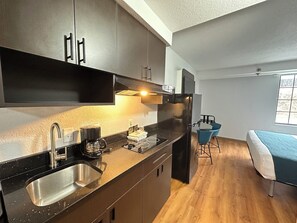 Full-size fridge, microwave, coffee/tea maker, toaster