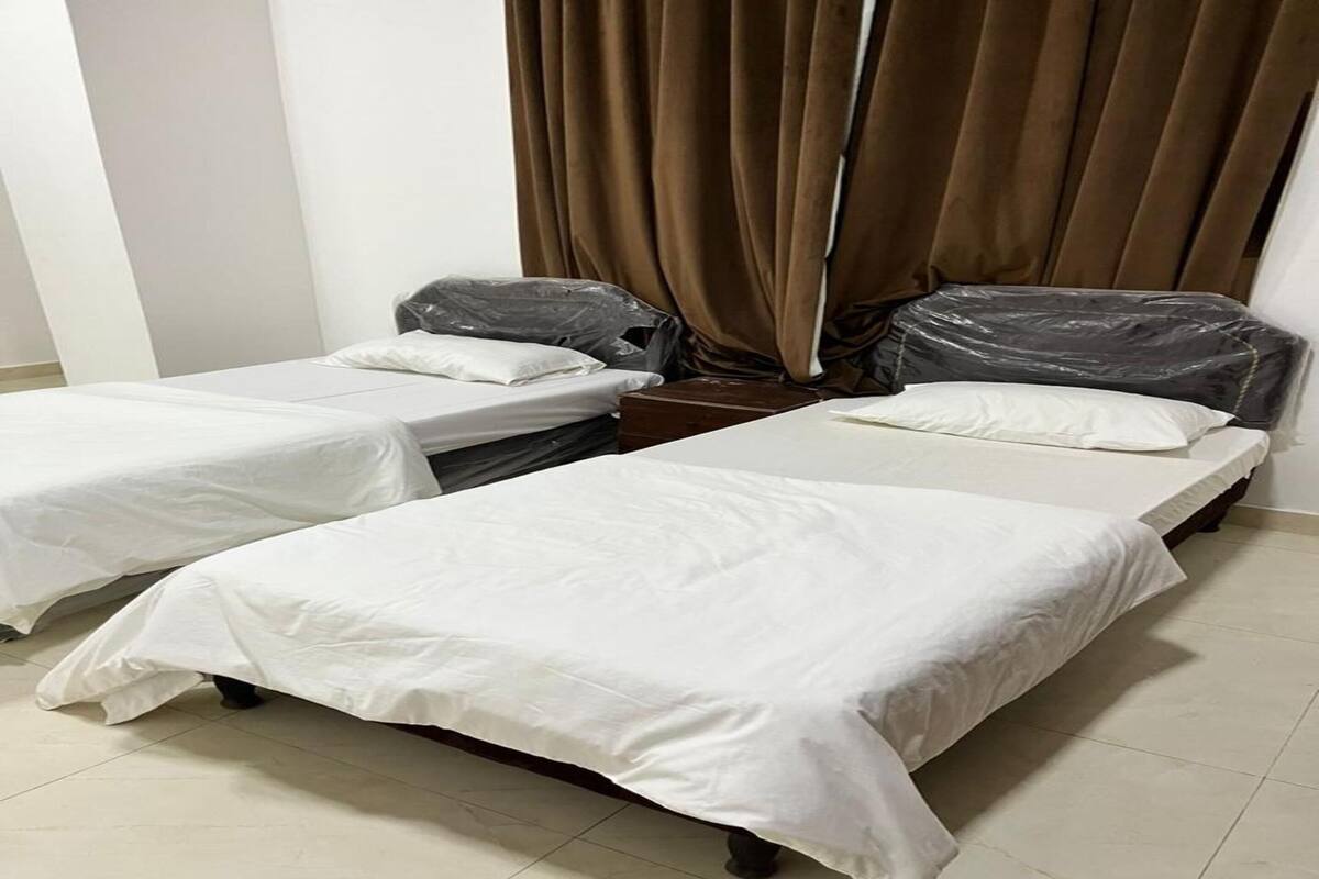 Apartemen Standar | Ruang kerja ramah laptop, Wi-Fi gratis, dan seprai linen