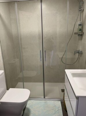 Hair dryer, towels, soap, shampoo