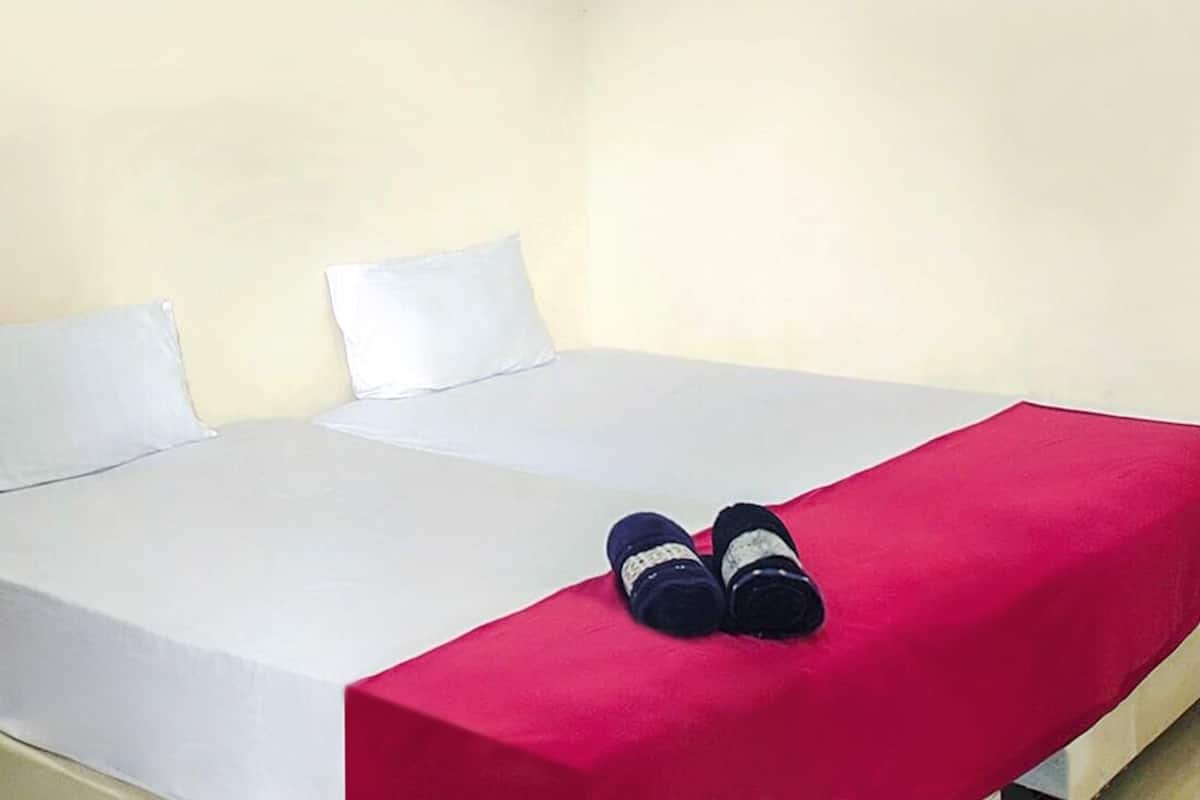 Habitación Deluxe con 2 camas individuales | Wifi gratis y ropa de cama