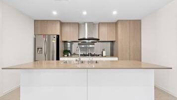 Microwave, stovetop, dishwasher, cookware/dishes/utensils