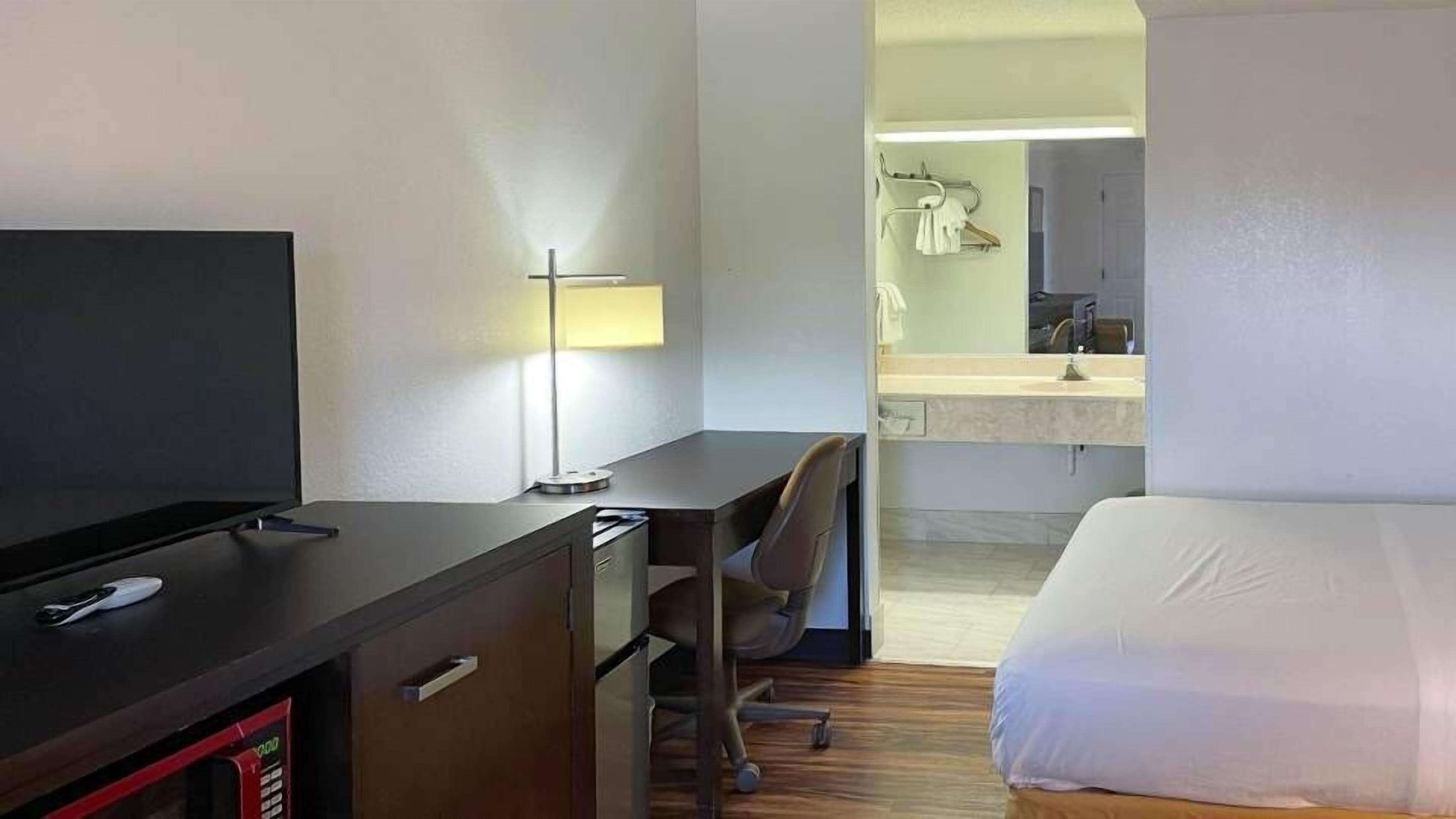 Desk, blackout curtains, free WiFi, bed sheets