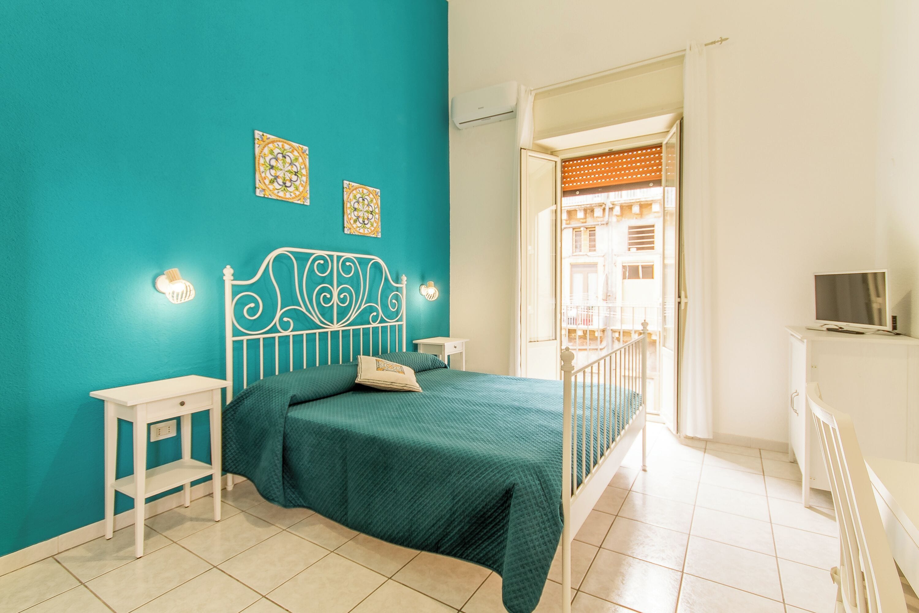 Apartemen Keluarga, beberapa kamar, 2 kamar mandi (Sicula home in the city center) | 3 kamar tidur, ruang kerja ramah laptop, Wi-Fi gratis, dan seprai linen