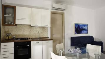 Apartemen, 2 kamar tidur, Boleh Merokok, balkon | Area keluarga