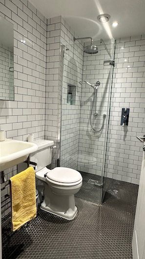 Apartment, 1 Bedroom, Garden View | Bathroom | Shower, towels, toilet paper