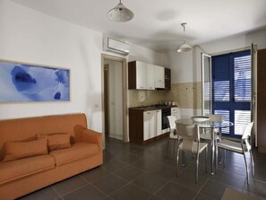 Apartment, 2 Bedrooms, Smoking, Balcony | Living area - Dolce Mare 7 - Sea and Beach View - AC - Wifi - Garage - Balcony - 2nd Floor (Modica)