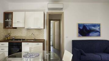 Apartemen, 2 kamar tidur, Boleh Merokok, balkon | Area keluarga