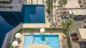 Outdoor pool - Homesgetaway - JLT Lake Views 1BR (Dubai)