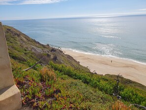 Beach nearby, sun loungers