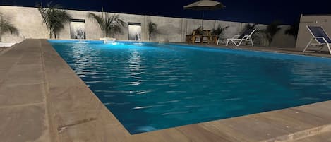 Outdoor pool, pool umbrellas, pool loungers
