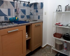 Fridge, microwave, stovetop, coffee grinder