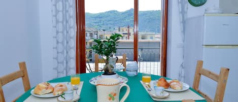Apartment, 2 Bedrooms, Smoking, Balcony | Living area | 35-inch Smart TV with cable channels, TV