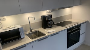 Apartment | Private kitchen - Remarkable Apartment by the Globe Avici Arena (Johanneshov)