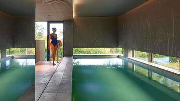 Indoor pool, open 7:00 AM to 10:00 PM, sun loungers