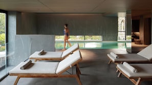 Indoor pool, open 7:00 AM to 10:00 PM, sun loungers