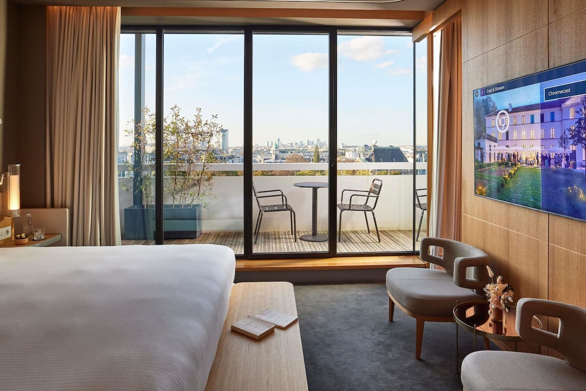 Suite, 1 King Bed (Eiffel) | 1 bedroom, premium bedding, free minibar, in-room safe