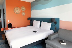 Premium bedding, desk, laptop workspace, soundproofing