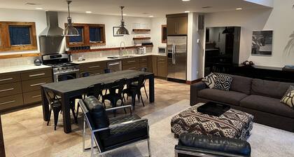 Stunning and private mid-century modern inspired cottage nestled in the woods.