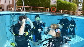 Outdoor pool, pool umbrellas, pool loungers