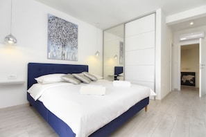 Premium bedding, memory-foam beds, in-room safe, blackout curtains