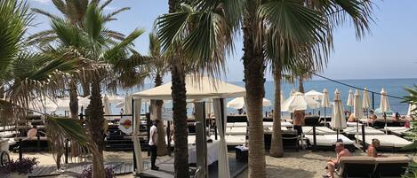 Sun-loungers, beach towels