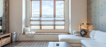 Modern townhome in downtown, Roof-top patio w/River views, walk to breweries