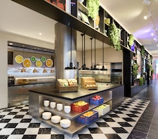 Daily buffet breakfast (USD 21.00 per person)