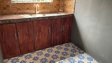 Basic Apartment | Private kitchen | Mini-fridge, cookware/dishes/utensils
