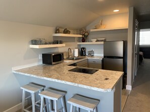 Fridge, microwave, dishwasher, coffee/tea maker